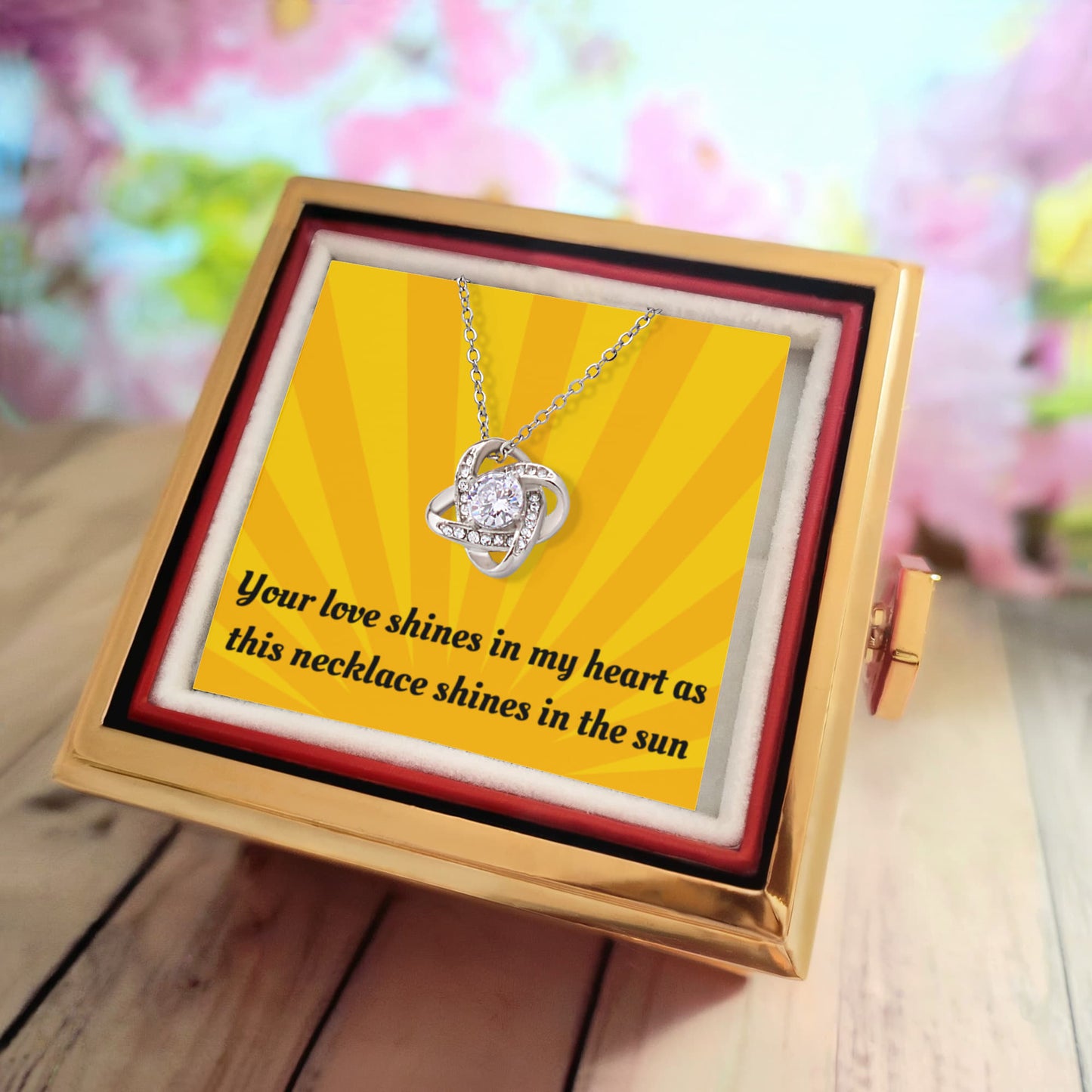 LOVE KNOT NECKLACE WITH ROTATING ROSE GIFT BOX AND MESSAGE CARD
